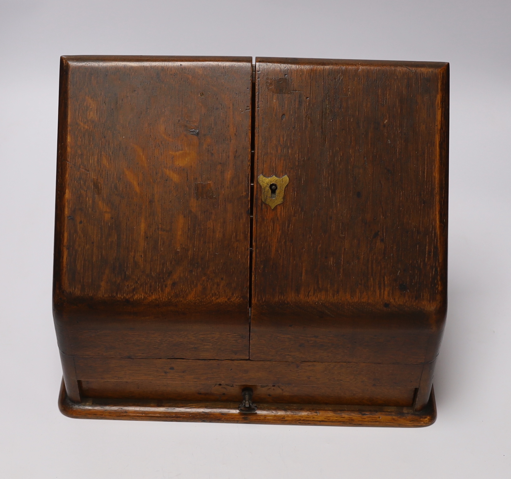 Three boxes; a miniature Polyphon, a stationery box and an inlaid jewellery box, stationery box 26cm high, 32cm wide
